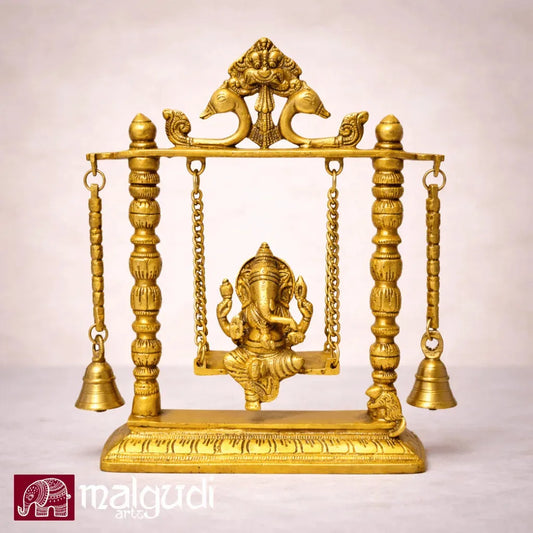 Ornate brass Ganesh on swing, with chain and bells